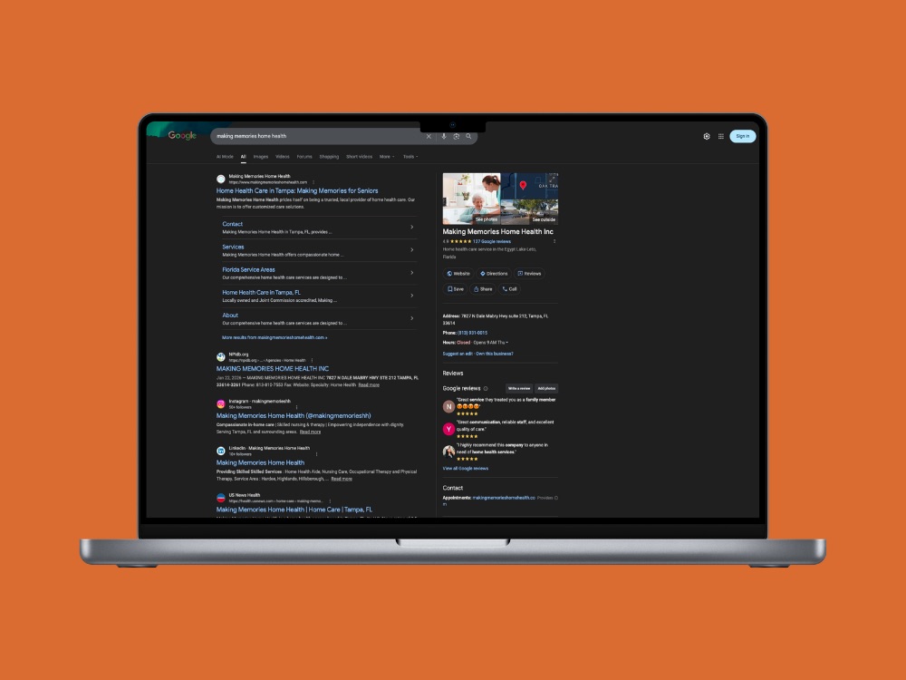 Laptop showing a client's Google search results and business profile